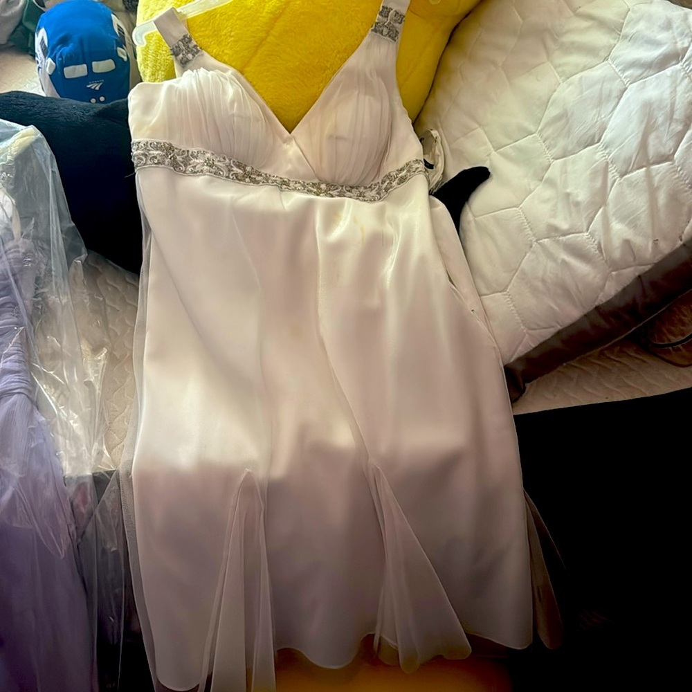 A Dave and Johnny white prom dress size 7/8. Serious buyers only